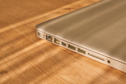 metallic grey laptop on a table photo