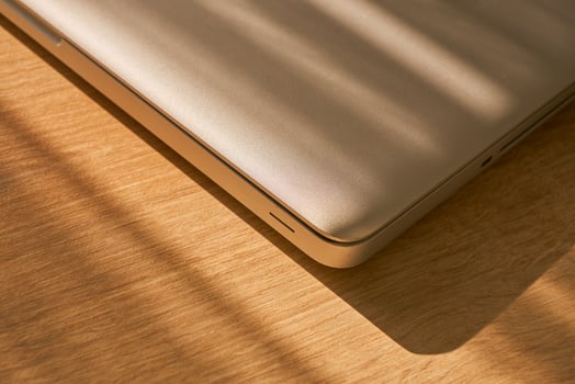 metallic grey laptop on a table photo