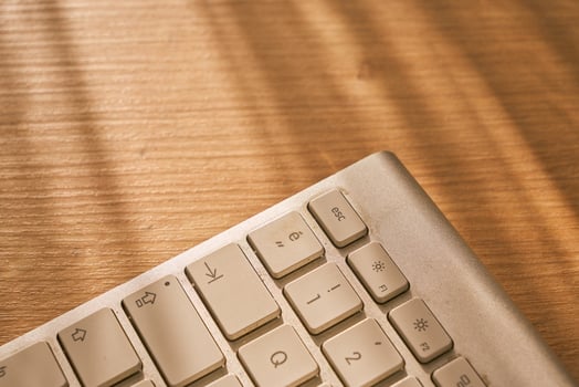 metallic grey laptop on a table photo