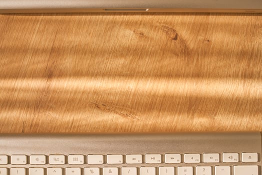 metallic grey laptop on a table photo