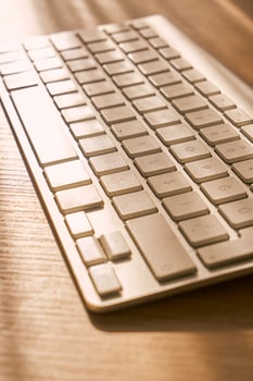 metallic grey laptop on a table photo