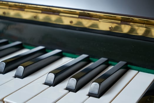 Black wall type piano photo