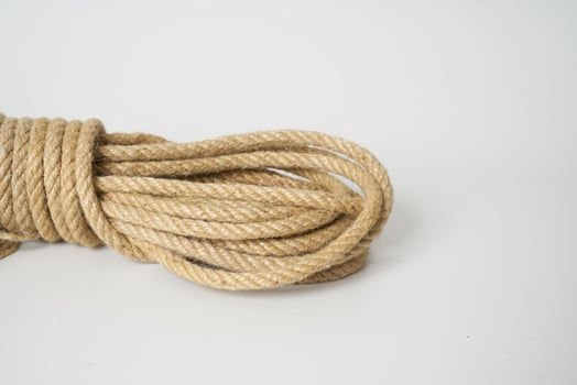 brown rope on white background photo