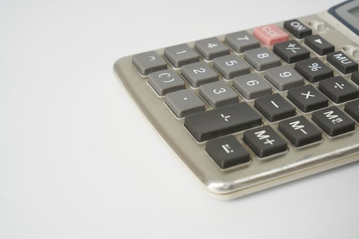 retro calculator on white background photo