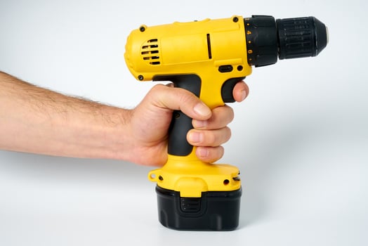 Yellow and black cordless drill. photo