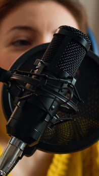 Woman vlogger answering questions from fans on online podcast show. Creative online show On-air production internet broadcast host streaming live content, recording digital social media communication photo