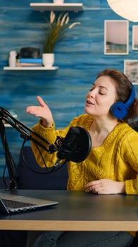 blogger reading emails on laptop with green screen display during broadcast. Creative online show On-air production internet broadcast host streaming live content using chroma key laptop photo