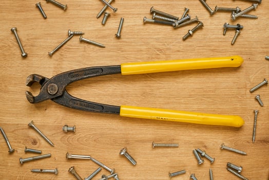 Pliers on a table photo