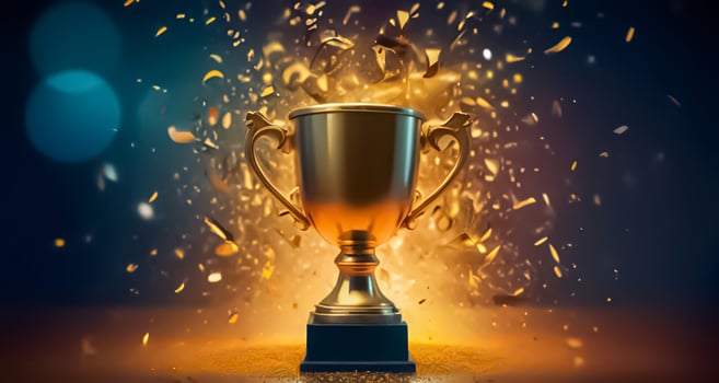 Champion golden trophy cup, surrounded by a festive explosion of colorful celebration confetti and sparkling glitter, symbolizing victory and success in a competition photo
