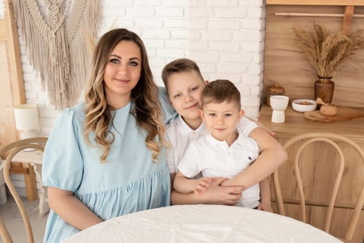 young parents hold the baby in their arms. family lifestyle photo with baby. family concept