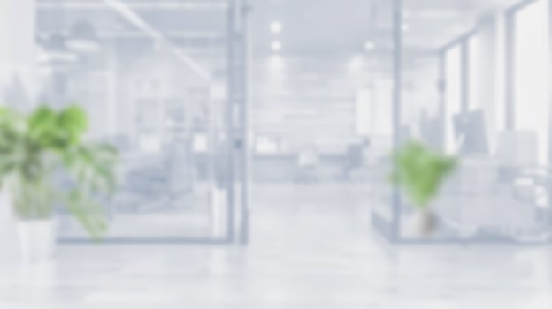 Blurred empty open space office. Abstract light bokeh at office interior background for design. photo