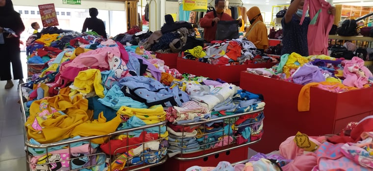 Surakarta, Indonesia, March 05, 2023. Large sign sale in a clothing store. photo
