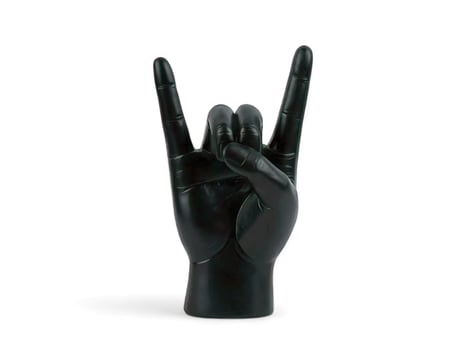 black hand decoration with metal shapes on a white background photo
