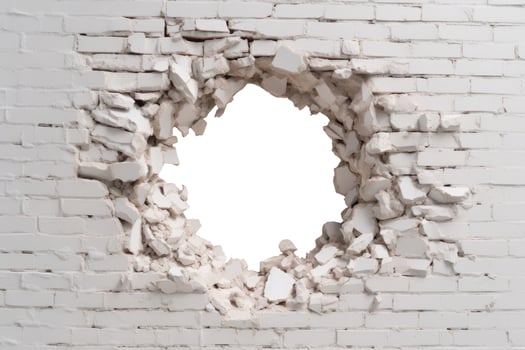 Hole in White Brick Wall, Isolated on White photo