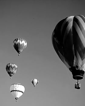 Black and white hot air balloons background photo