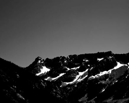 Mountains black and white photo background. High mount, rocks and hills landscape