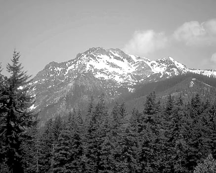 Mountains black and white photo background. High mount, rocks and hills landscape