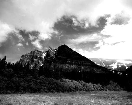 Mountains black and white photo background. High mount, rocks and hills landscape
