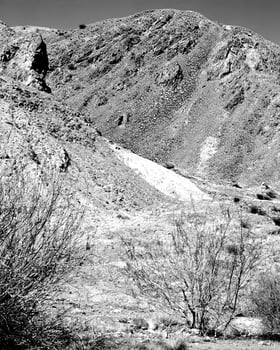 Mountains black and white photo background. High mount, rocks and hills landscape