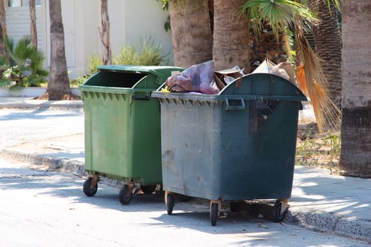 Green and blue recycling Plastic bin container or garbage Trash Can on the street Cyprus photo