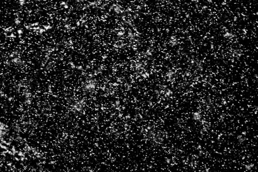 Snowfall on a black background - design element photo