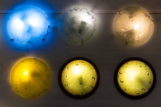 Moscow, Russia, may 2018 round multi colored wall sconce lamps in supermarket photo