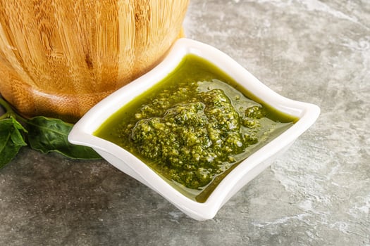 Homemade vegetarian basil pesto sauce photo
