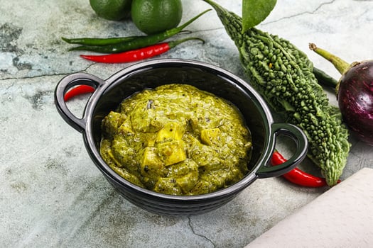 Indian cuisine - palak paneer cheese with spinach photo