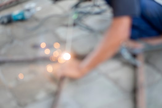 Blurred welding work with sparks photo