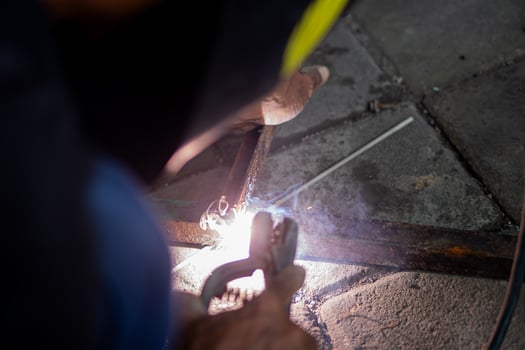 Close-up of welding metal with sparks photo