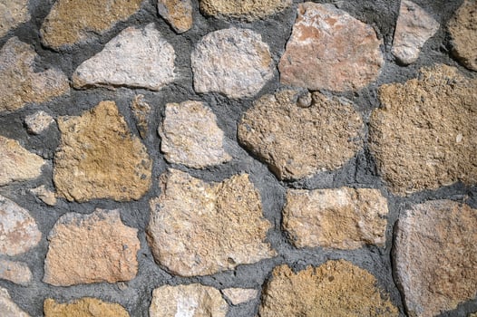 House wall made of natural stones and shell rock as background 1 photo