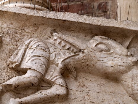 Verona dome cathedral church exterior sculptures detail. Romanesque sculpture attributed to the workshop of Veronese sculptor Brioloto photo