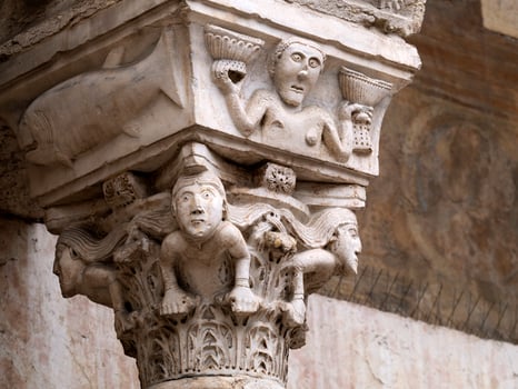 Verona dome cathedral church exterior sculptures detail. Romanesque sculpture attributed to the workshop of Veronese sculptor Brioloto photo