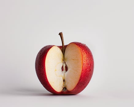 a red apple with a bite taken out of it photo