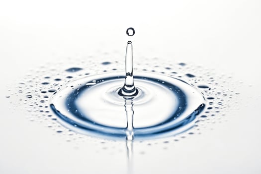 Water Drop Impact with Ripple Effect photo