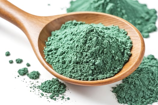 Green Clay Powder in Wooden Spoon photo