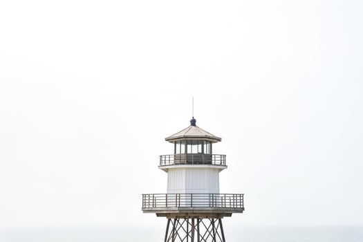 Lighthouse on a Foggy Day photo