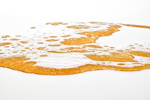 Honey Drizzle On White Background photo