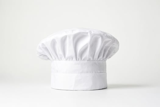 White chef hat on a white background photo