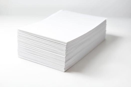 Stack of White Paper on White Background photo