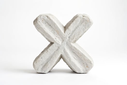 Stone letter X photo