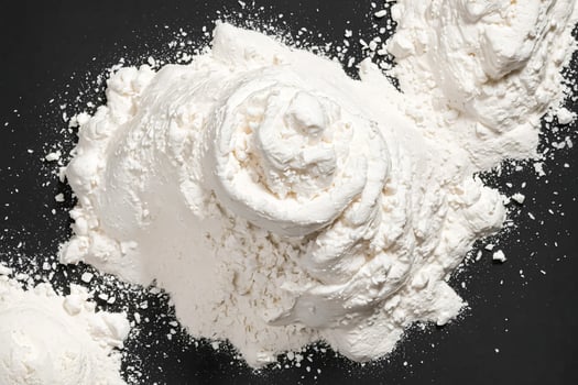 White Powder on Black Background photo