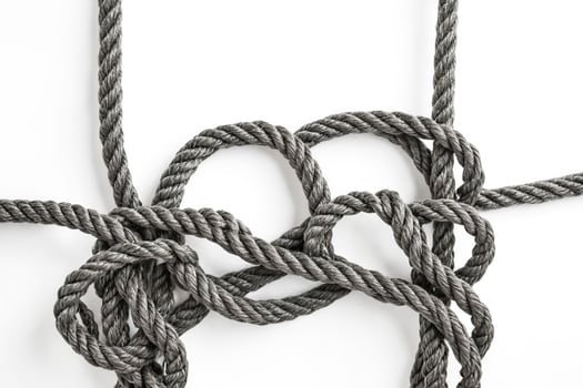 Knotted Rope on White Background photo