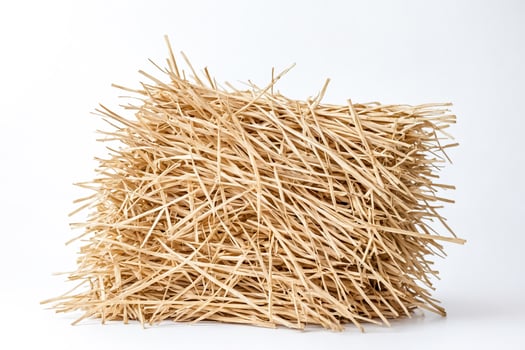 Natural Straw Nest Isolated On White Background photo