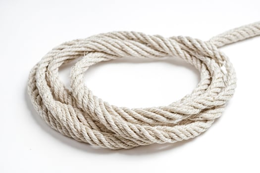 Closeup of a coil of thick white rope photo