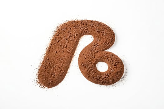 Cocoa Powder and Coffee Beans Form the Letter R photo