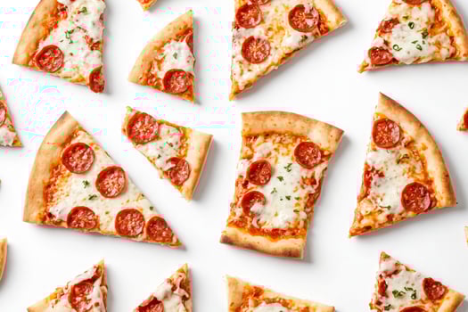 Pepperoni Pizza Slices on White Background photo