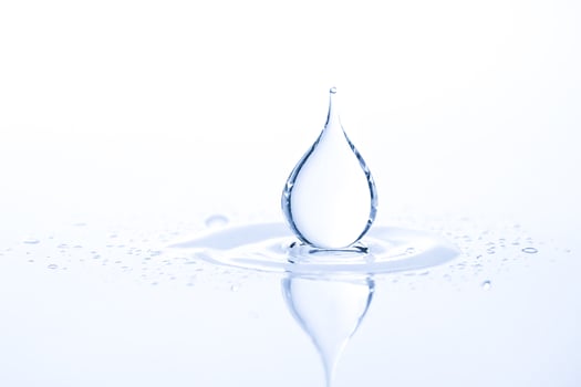 Water Drop Splashing in Water photo