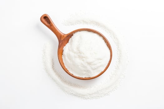 Fresh Baking Soda in Wooden Scoop photo