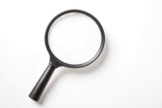 Black Magnifying Glass On White Background photo